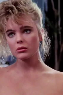 Video by xcitedoc with the username @xcitedoc,  March 8, 2024 at 11:50 AM. The post is about the topic Erika Eleniak and the text says 'Baywatch swimsuit Erika #erikaeleniak #baywatch #swimsuit'