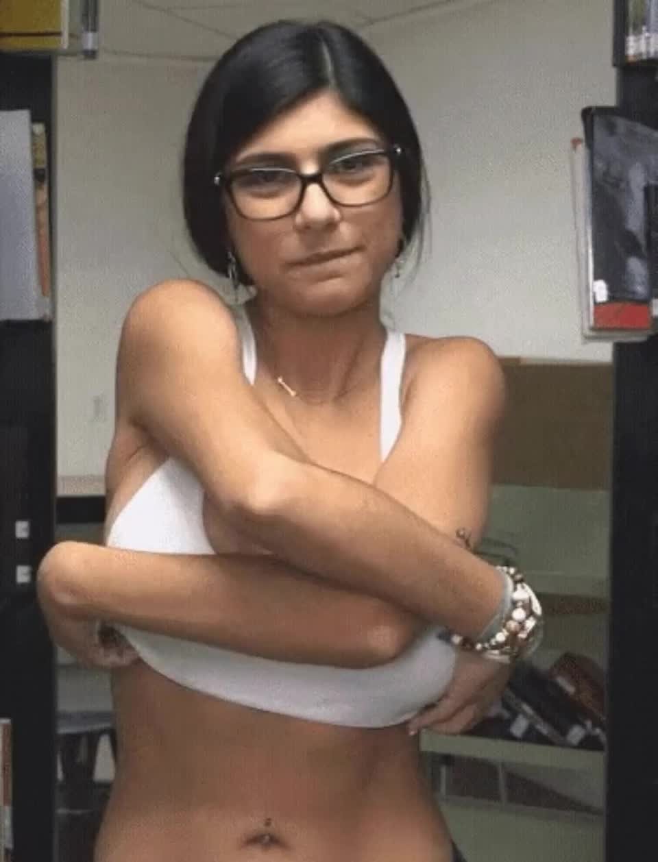 Video by maxis735 with the username @maxis735,  February 18, 2023 at 1:52 AM. The post is about the topic Mia Khalifa and the text says '#bigboobs #bigtits #busty #bigass #pov #milf #beauty #amateur #naturalboobs #onoff #beforeafter #dressedundressed #anal #lesbian'