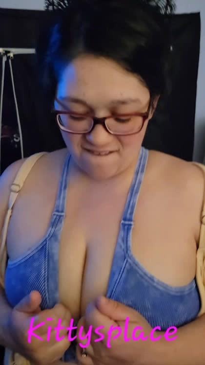 Video by KittysPlace with the username @KittysPlace, who is a verified user,  May 9, 2024 at 1:31 PM and the text says 'Popping those buttons!
#DDD #Teasing #cleavage #milf #wife #glasses'