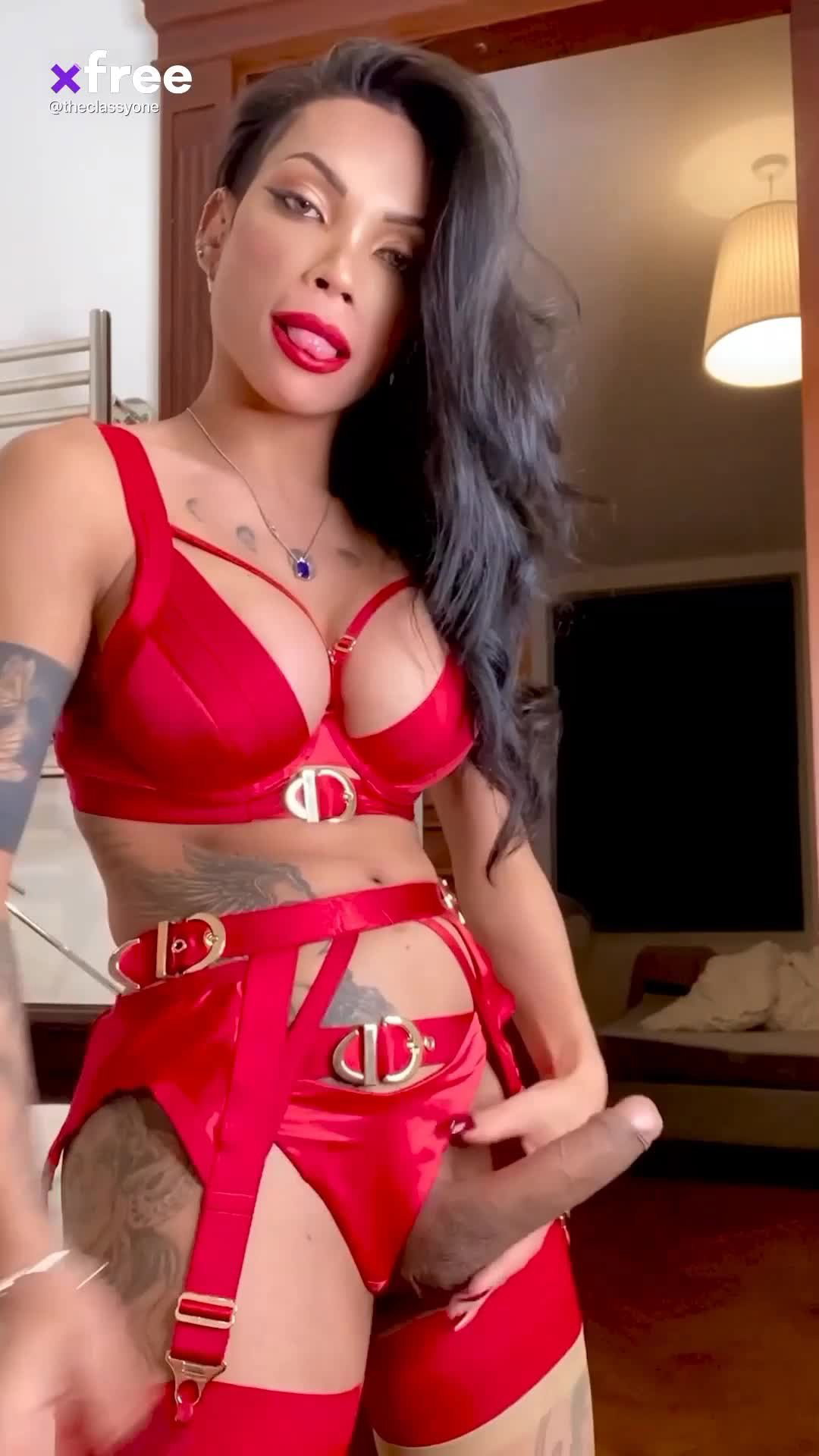 Video by Photodus65 with the username @Photodus65, who is a verified user,  July 6, 2023 at 2:56 PM. The post is about the topic Trans Women and the text says 'Lady in red...😋'