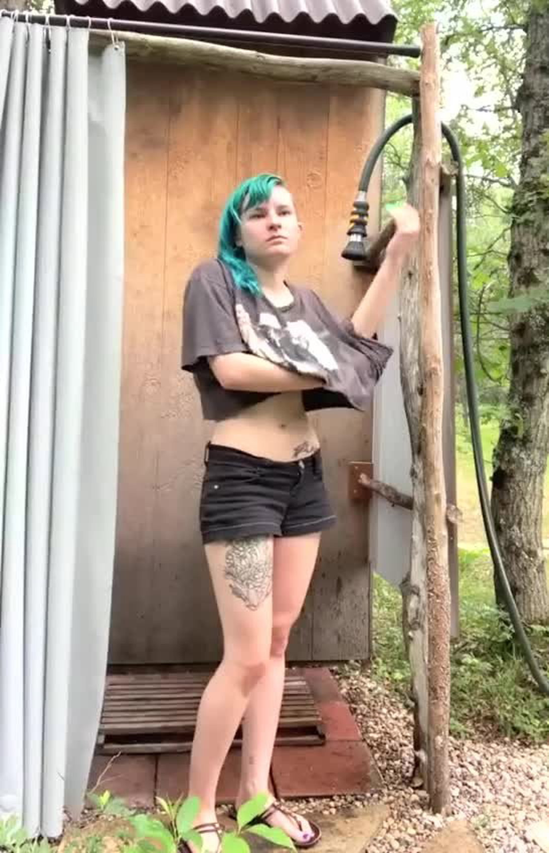 Video by SirinaDroll with the username @sirinadroll, who is a verified user,  May 14, 2023 at 3:17 AM. The post is about the topic Young and the text says 'Alternative Cutie Takes #Outdoor #Shower 1 #nude #nakedness #undressed #spycam #teen #inked #tattoodo #ink #tatooine #tatooate #tatoo #inkedgirl #tattoogirls'