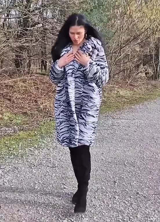 Video by SirinaDroll with the username @sirinadroll, who is a verified user,  March 9, 2024 at 2:35 AM. The post is about the topic Beauty Outdoor and the text says '#Walking in a coat on a #naked #body'