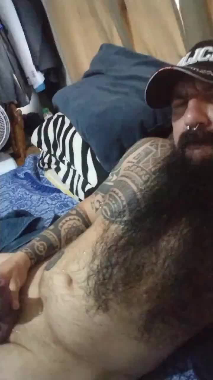 Video by DirtyDaddyFunStuff with the username @DirtyDaddyPorn, who is a verified user,  January 6, 2024 at 1:20 AM and the text says 'LONG BEARD CUMMER!  #tats #beards #bears #cum #cumshot'