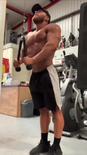 Shared Video by DirtyDaddyFunStuff with the username @DirtyDaddyPorn, who is a verified user,  July 3, 2024 at 10:21 PM and the text says 'COMMANDO in the gym!  And semi hard, too!'