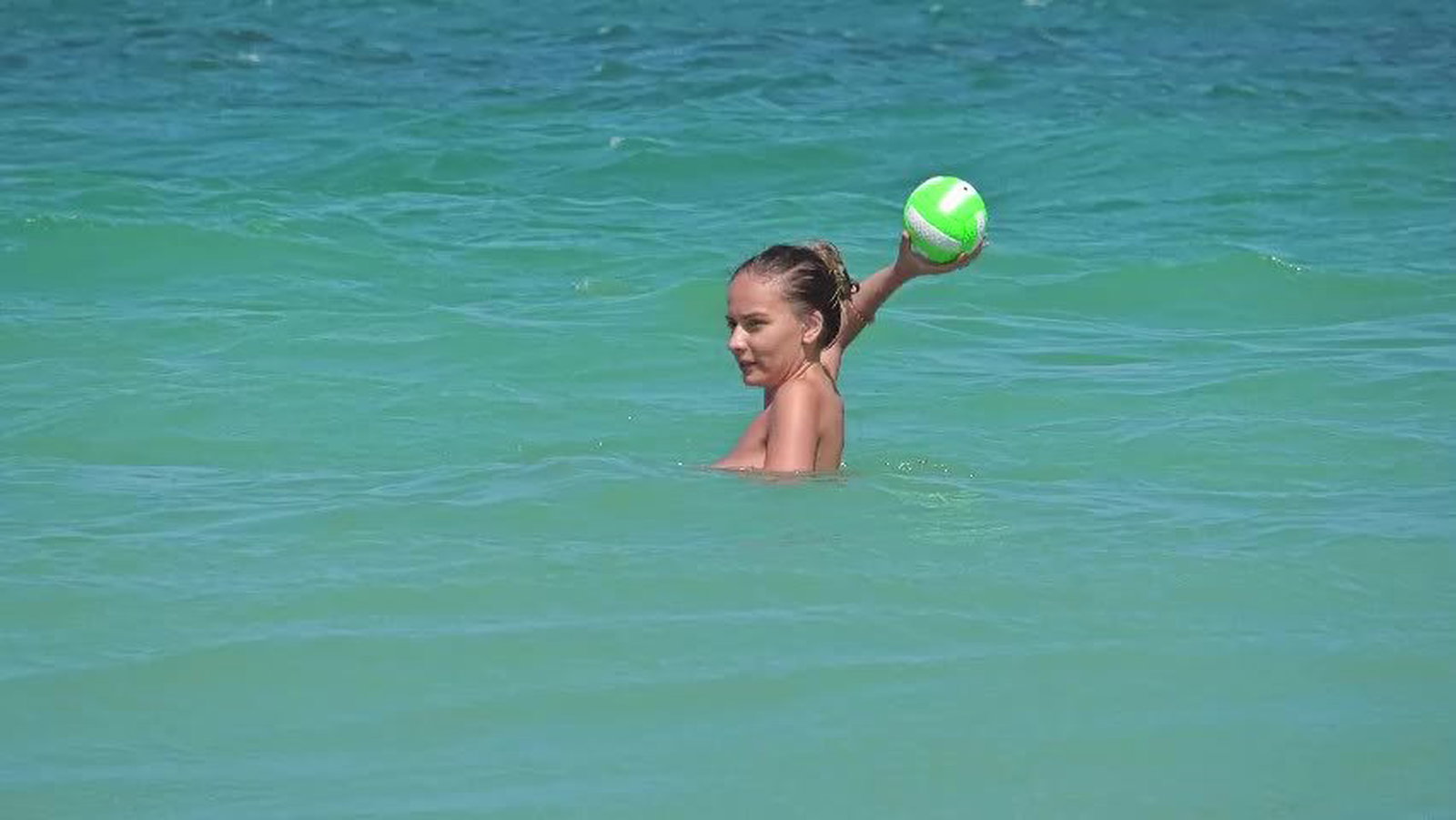 Video by 67naked with the username @67naked, who is a verified user,  April 29, 2024 at 6:04 PM. The post is about the topic Beach Girls and the text says 'a nice lady plays with a ball in the water'