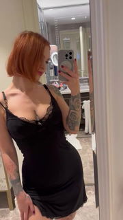 Video by Scarlet Red Dragon with the username @redheadragonmodel, who is a star user,  November 2, 2024 at 8:26 PM. The post is about the topic MILF and the text says 'Is my dress suitable for our date?🥰'