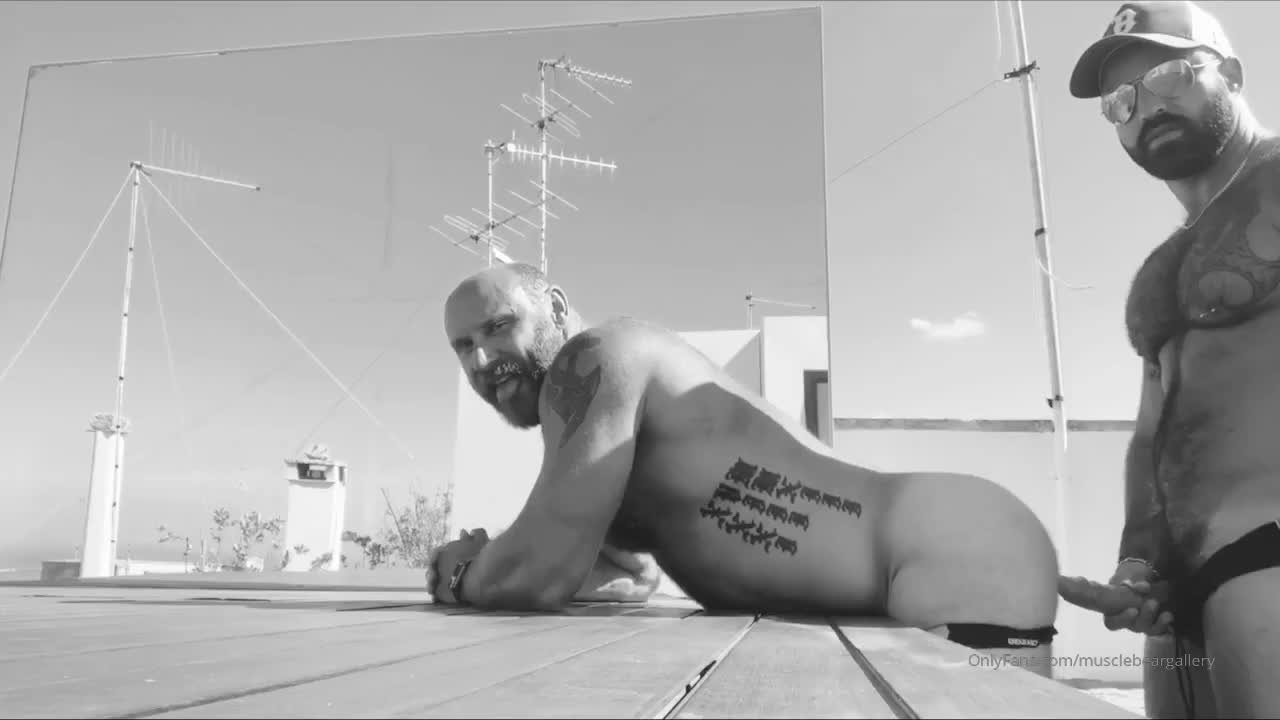Video by Nickplus33 with the username @Nickplus33, who is a verified user,  October 6, 2023 at 3:24 AM and the text says '#hotvid #dilf #daddy #caps #hairy #beard #specs #doggy #anal #fuckun #outdoors #bw'