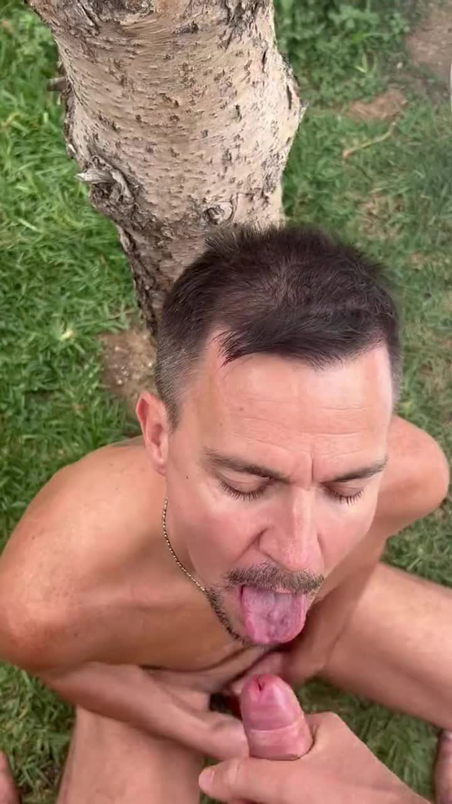 Video by Nickplus33 with the username @Nickplus33, who is a verified user,  February 24, 2024 at 2:13 AM and the text says '#tongue #cumfacial #dilf #chain #outdoors #cum #cumeater'