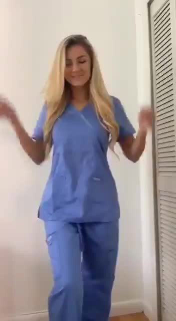 Video by Caffiend with the username @Caffiend,  May 14, 2021 at 8:46 PM and the text says '#Scrubs #LoveYourNurse #Striping #Blonde #Hottie'