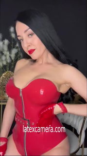 Video by LatexAngel with the username @LatexAngel, who is a star user,  August 13, 2024 at 9:15 AM and the text says 'Does my red latex corset on latexcamera tease you and tempt you? 🥰

#redlatexcorset #latexcorset #redlatex #latex #corset #fetish #blackhair #greeneyes #MILF #bigtits #angelikacroft #latexcamera'