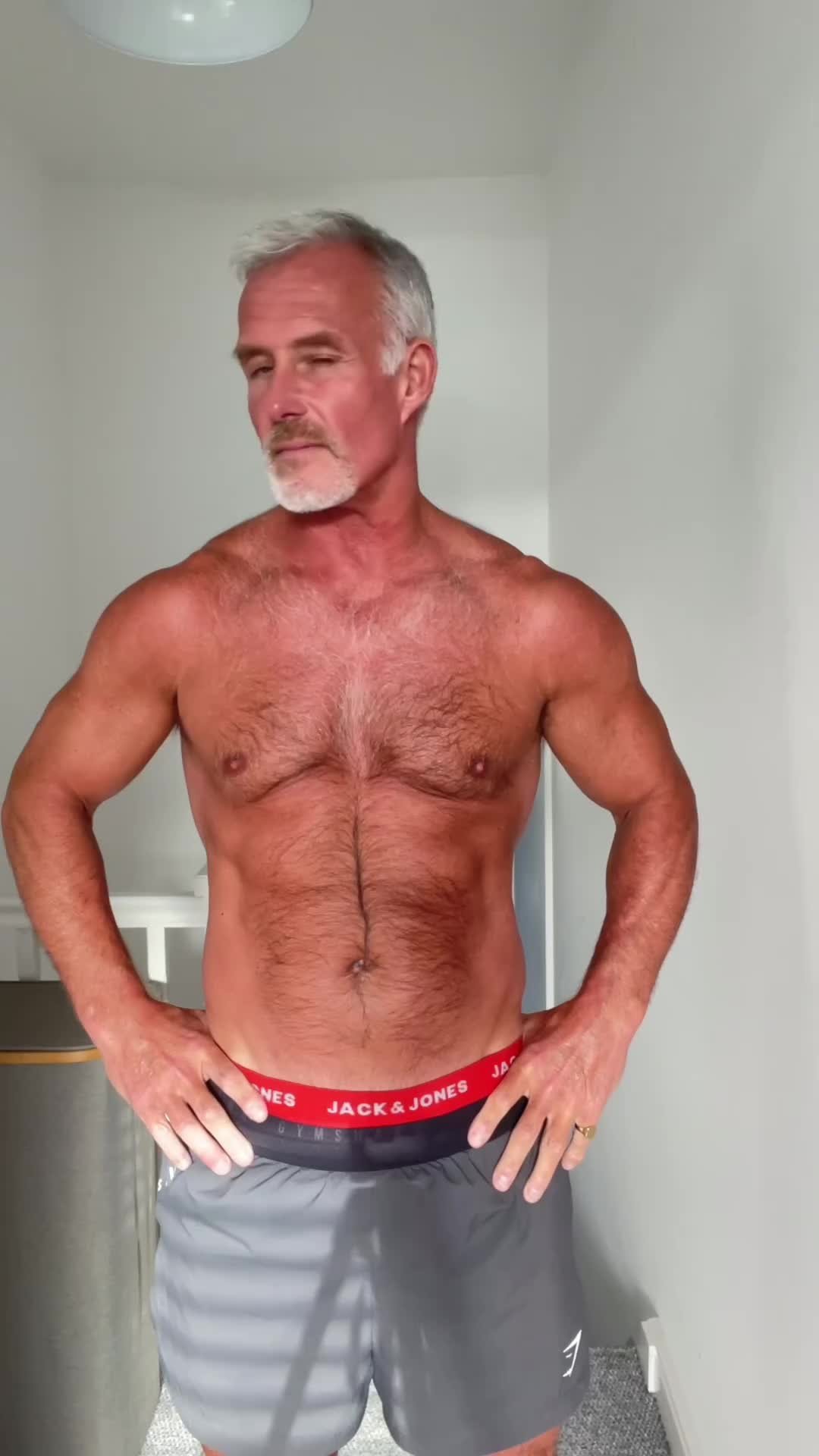 Shared Video by Ivan Ivanov with the username @argos2019,  March 31, 2024 at 4:45 AM and the text says '#granddaddy #daddy #toned #hairy #beard #tanned'