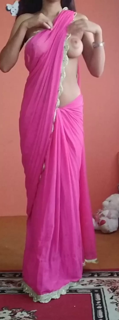 Shared Video by bull21 with the username @bull21,  May 8, 2023 at 6:32 AM. The post is about the topic Hijab Hotties and the text says '#Saree #Sari #Pallu #Anchal #HijabHotties
A sari is a traditional dress worn by women in Indian subcontinent, that consists of an un-stitched stretch of woven fabric, arranged over the body as wrapped around the waist, with one end tucked in to waist,..'