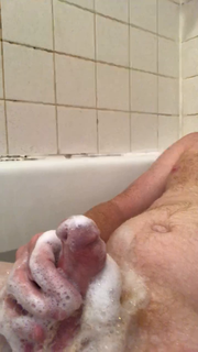 Jerking cock in tub