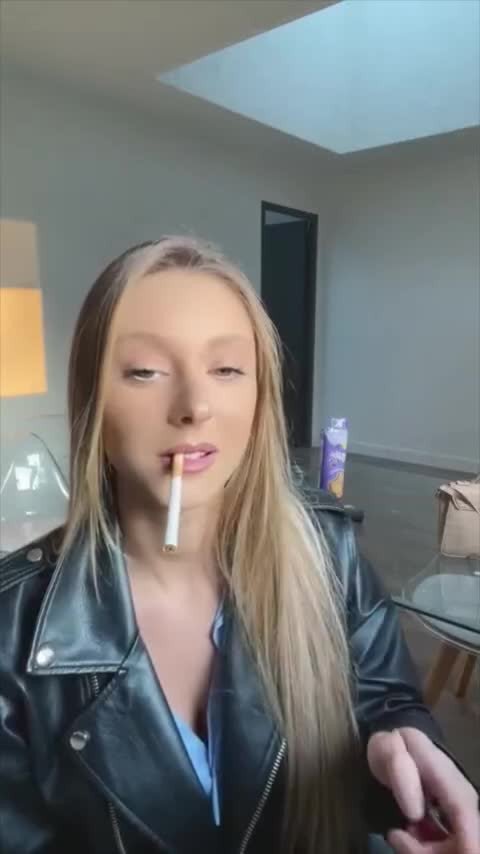Video by Corstophine with the username @Corstophine,  April 10, 2024 at 5:02 PM. The post is about the topic Smoking women and the text says 'Sexy side of the mouth exhales'