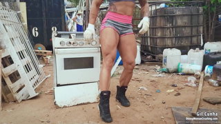 Video by MusclegirlStrength with the username @MusclegirlStrength, who is a brand user,  June 24, 2024 at 4:10 AM and the text says 'Muscular Gil Cunha Crushes Stove with Raw Power:
https://bit.ly/3mCptAB

Gil Cunha uses her brute force and muscles to destroy a metal oven in a scrapyard.

#musclegirl #musclegirllove #femalemuscle #femalemuscles #featsofstrength #MuscleCrushMonday..'