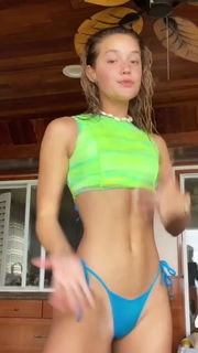 Video by Teagan with the username @rawrasorus,  August 11, 2021 at 6:19 AM. The post is about the topic TikTok and the text says '#tiktok #bikini #blonde #dance'