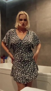 Shared Video by Taki76 with the username @Taki76,  June 18, 2024 at 2:01 PM. The post is about the topic Dress Up and the text says 'That's an enormous bathtub though'
